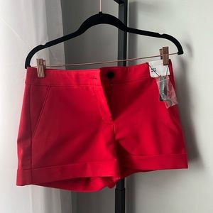 Red mid-rise shorts